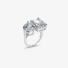 Silver 'Toi et Moi' style Kylie Ring featuring a round and a rectangular cubic zirconia, adjustable band.