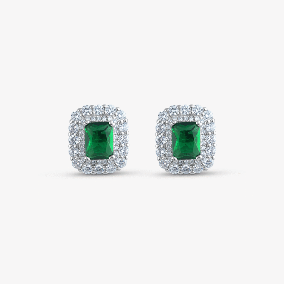 An emerald-cut green stud earring with a double halo of sparkling clear stones on a white background.